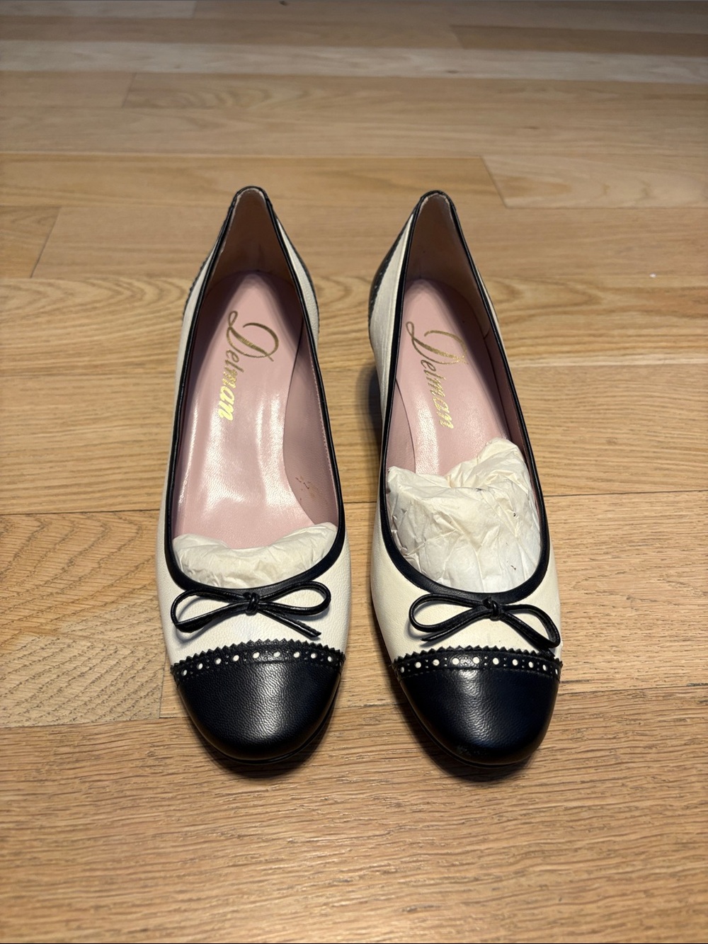 Delman Two-Tone Bow Cap-Toe Kitten heel in Cream and Black